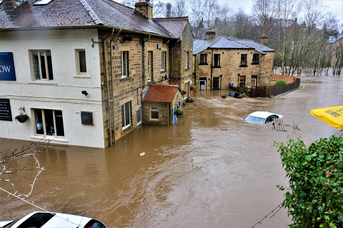 House and cars flooded